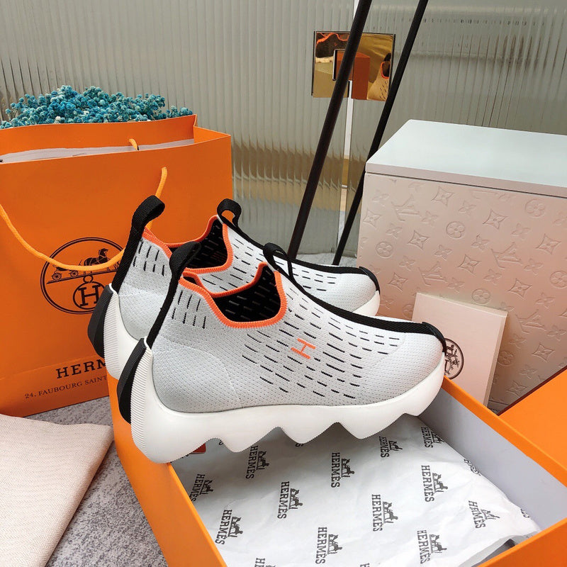 Hermes shoes Style 327 - close-up of iconic logo design (alternate angle)