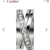 Close-up detail view of Cartier unisex jewelry piece