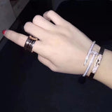 Side view of Cartier unisex jewelry piece