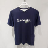 Flat lay presentation of Lacoste luxury clothing with signature branding