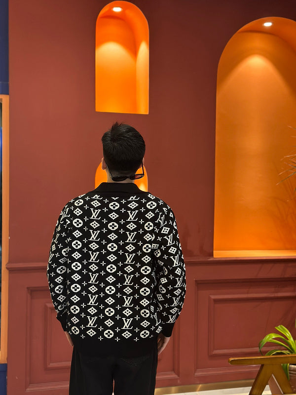 Close-up detail shot of Louis Vuitton luxury clothing with runway-inspired design