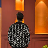 Close-up detail shot of Louis Vuitton luxury clothing with runway-inspired design