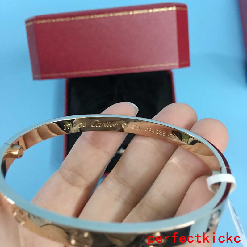 Angled view of Cartier unisex jewelry piece