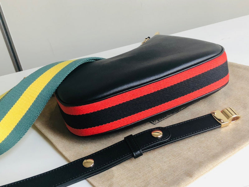 Handle and strap detail of elevated signature women's handbag – women's designer-style accessory