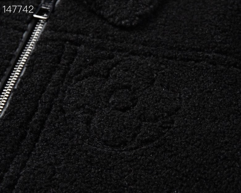 Side profile of Louis Vuitton luxury clothing with signature branding