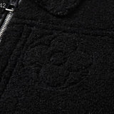 Side profile of Louis Vuitton luxury clothing with signature branding