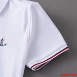 Flat lay presentation of Moncler luxury clothing with logo-detail design