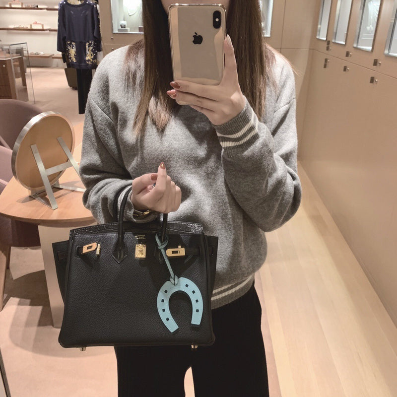 Poised bag shown from front angle