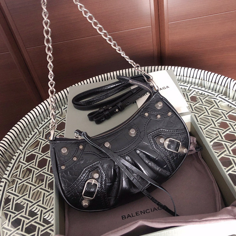 Back view of everyday-luxe polished women's handbag – women's luxury accessory