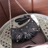 Back view of everyday-luxe polished women's handbag – women's luxury accessory