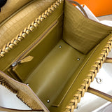 Side view of structured structured handbag