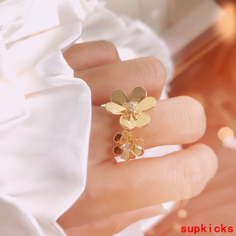 Lifestyle view of Van Cleef & Arpels unisex jewelry piece