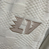 Side profile of Louis Vuitton luxury clothing with streetwear-inspired cut