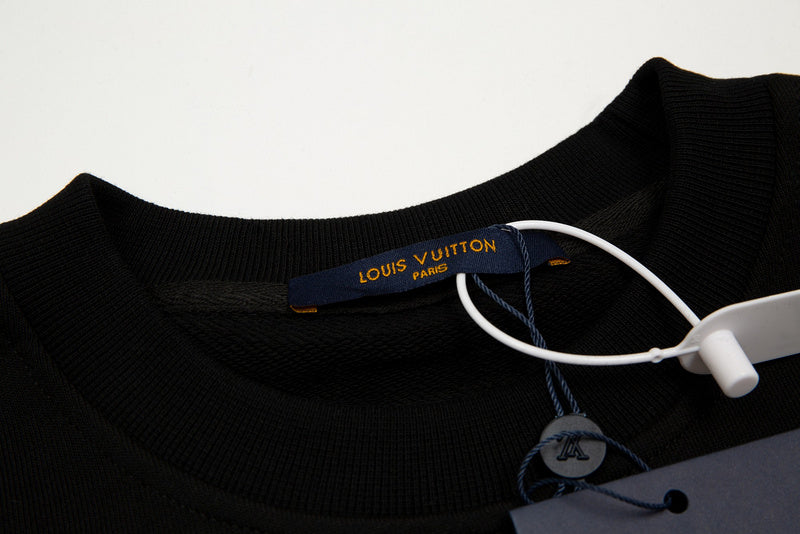 Front view of Louis Vuitton luxury clothing with signature branding