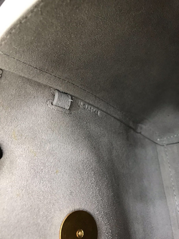 Handle and strap detail of signature statement women's handbag – women's everyday handbag