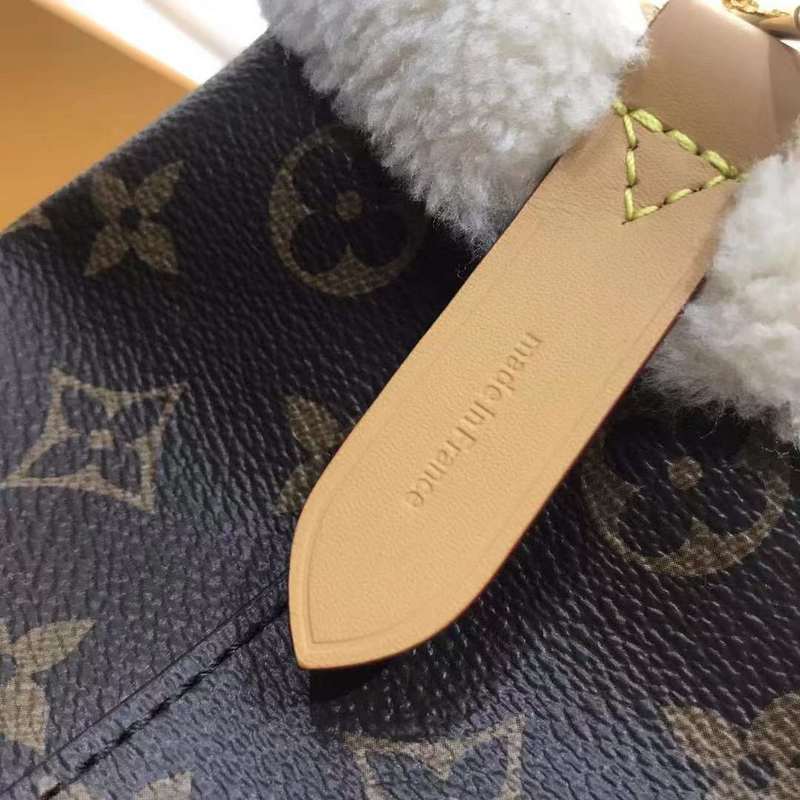 Top view of modern signature women's handbag – women's luxury accessory