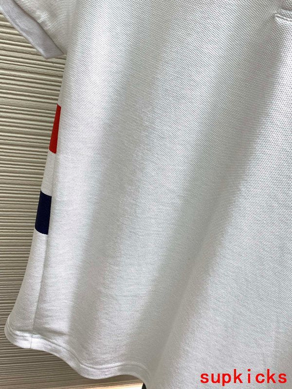 Side profile of Moncler luxury clothing with signature branding