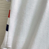 Side profile of Moncler luxury clothing with signature branding