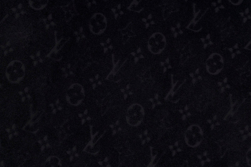 Back view of Louis Vuitton luxury clothing with everyday silhouette