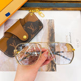 Angled view of Louis Vuitton unisex sunglasses