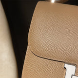 Side view of clean-lined structured handbag