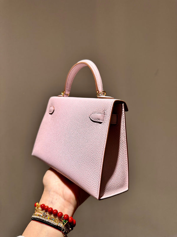 Side view of sculpted structured handbag