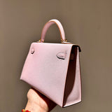 Side view of sculpted structured handbag