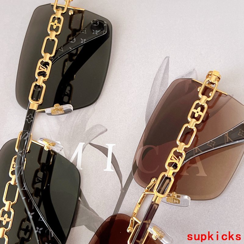 Close-up detail view of Louis Vuitton unisex sunglasses