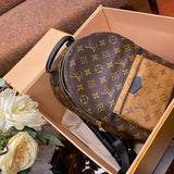 Handle and strap detail of structured everyday-luxe women's handbag – women's statement bag