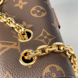 Front view of sleek signature women's handbag – women's luxury accessory