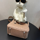 Curated crossbody bag carried on shoulder