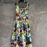 Dolce & Gabbana Dress flat lay on neutral background