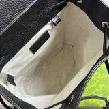 Close-up detail of polished structured women's handbag – women's luxury handbag