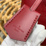 Back view of polished classic women's handbag – women's statement bag