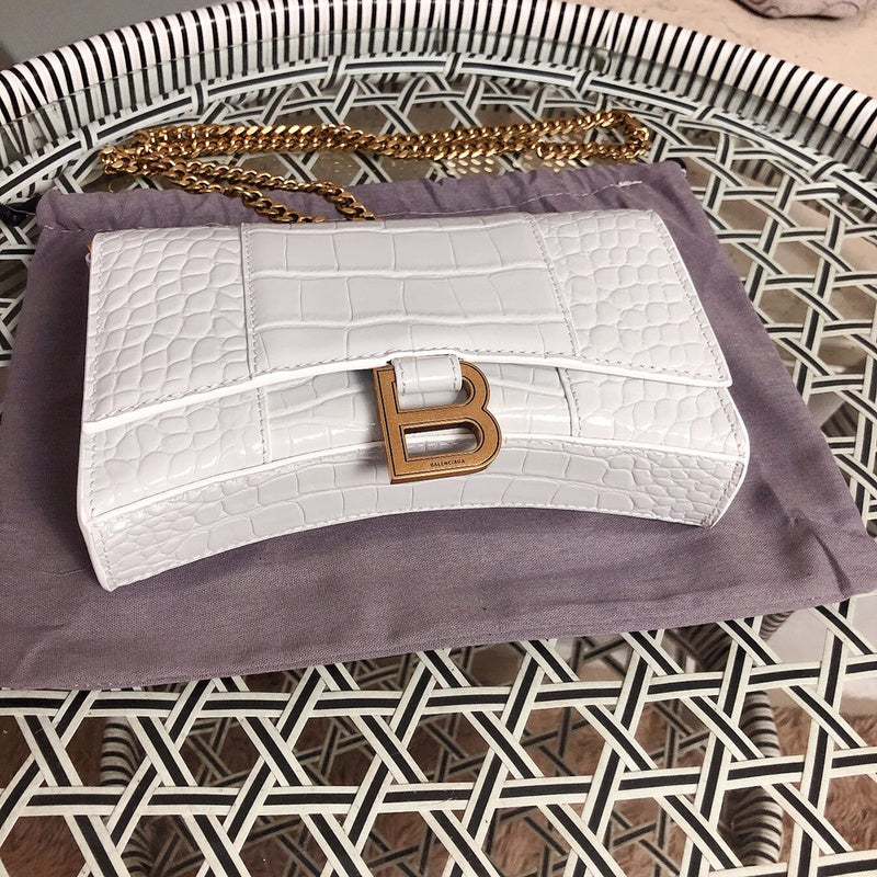 Styled lifestyle shot of chic polished women's handbag – women's statement bag