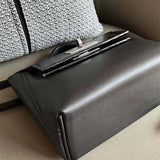 Side view of timeless structured handbag