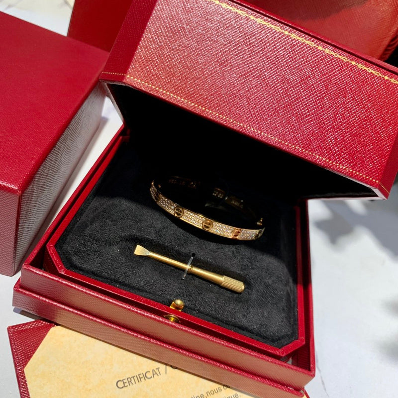 Side view of Cartier unisex jewelry piece