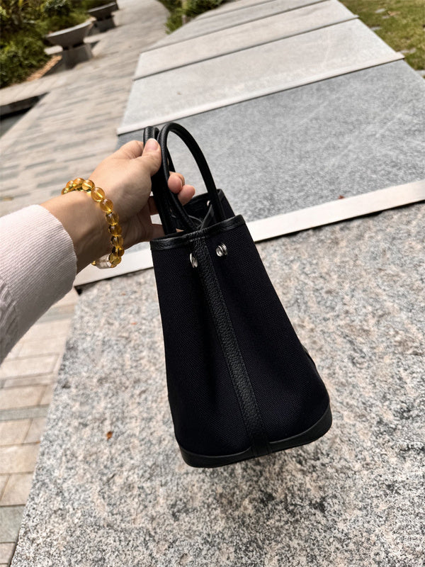 Side view of statement structured handbag
