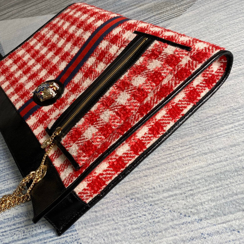 Handle and strap detail of elevated polished women's handbag – women's designer-style accessory