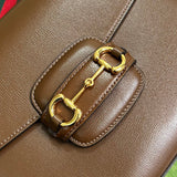 Handle and strap detail of sleek statement women's handbag – women's luxury handbag