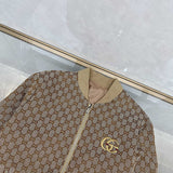 Side profile of Gucci luxury clothing with monogram-inspired silhouette