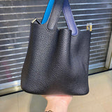 Side view of statement structured handbag