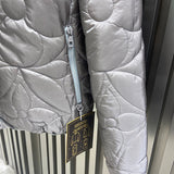 Front view of Louis Vuitton luxury clothing with logo-detail design