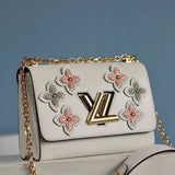 Front view of refined modern women's handbag – women's luxury accessory