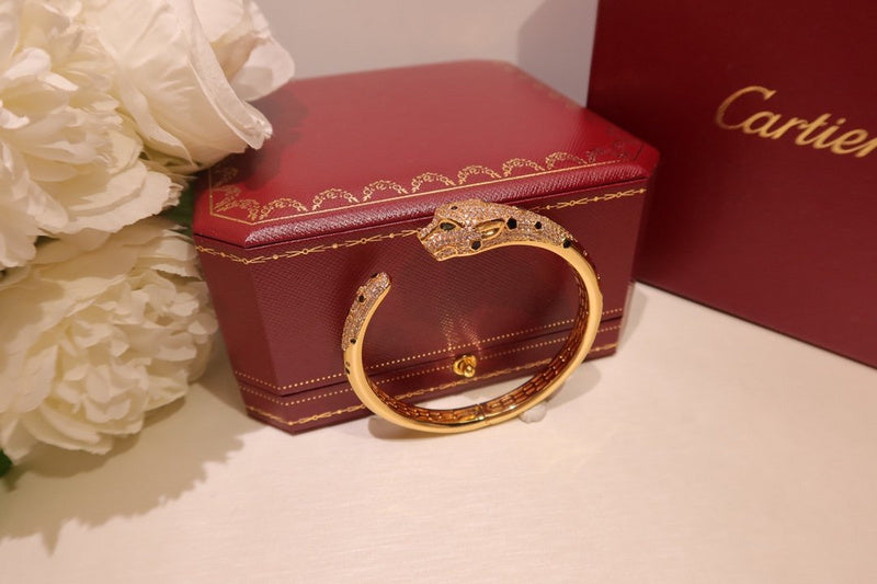 Angled view of Cartier unisex jewelry piece