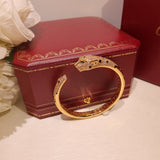 Angled view of Cartier unisex jewelry piece