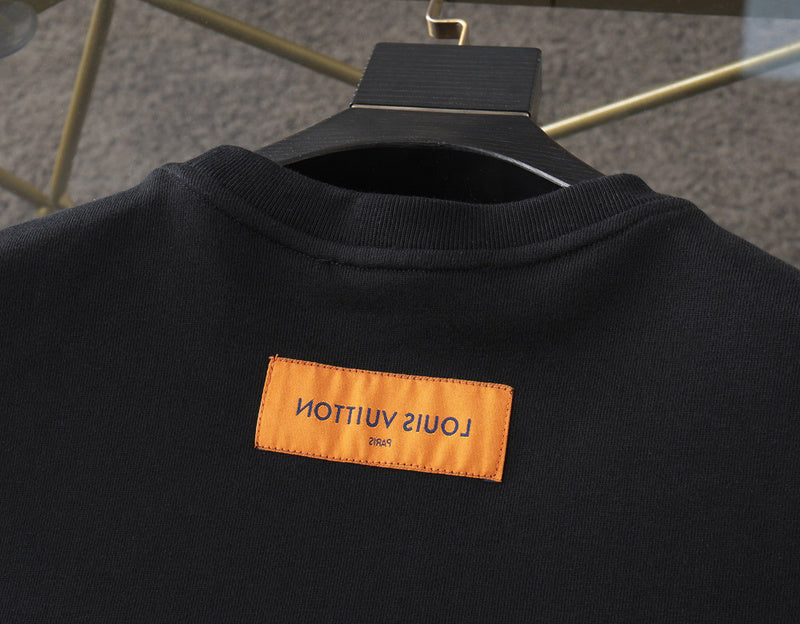 Side profile of Louis Vuitton luxury clothing with tailored silhouette