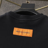 Side profile of Louis Vuitton luxury clothing with tailored silhouette