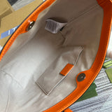 Handle and strap detail of everyday-luxe modern women's handbag – women's luxury accessory