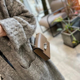 Close-up detail of sophisticated bag design
